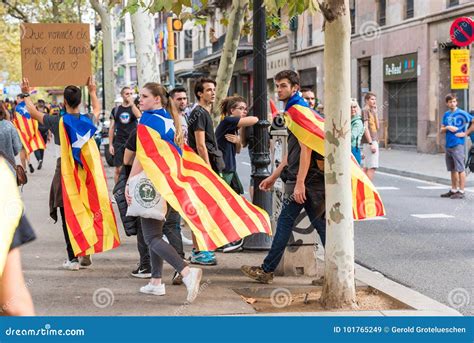 BARCELONA, SPAIN - OCTOBER 3, 2017: Demonstrators Bearing Catalan Flags ...