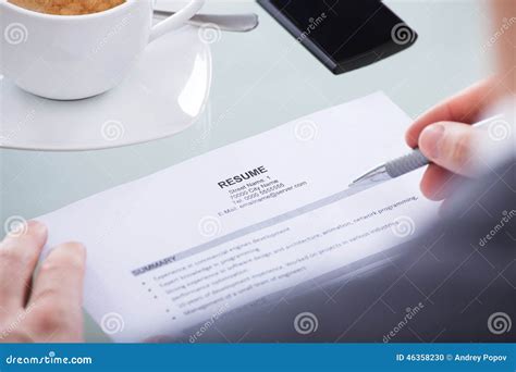 Businessperson Holding Resume Stock Photo - Image of experience, mobile: 46358230