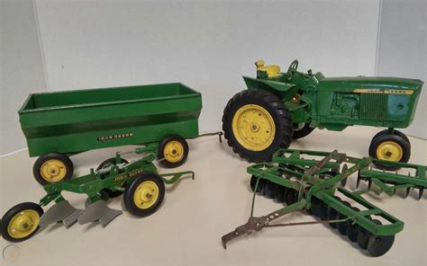 Vintage Metal John Deere Tractor Toy Farm diecast 1/16 scale with metal rear... | #1916826850