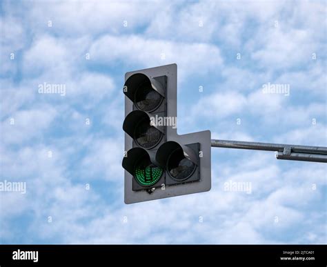 Traffic light changes from red to green Stock Photo - Alamy