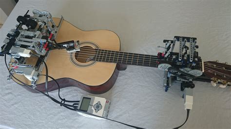 A Remarkable Automatic Guitar Strumming Robot Made Using LEGO ...