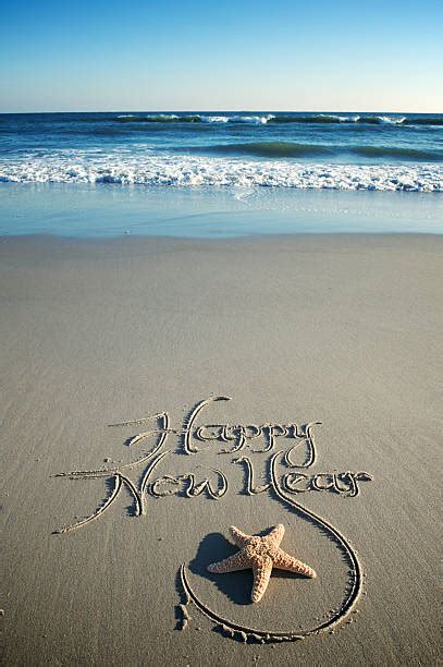 Happy New Year Beach Stock Photos, Pictures & Royalty-Free Images - iStock