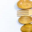 Border of wooden kitchen utensils — Stock Photo © jirkaejc #21578631