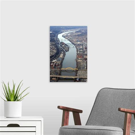 Aerial shot of bridges over a river in Pittsburgh, Pennsylvania Wall ...