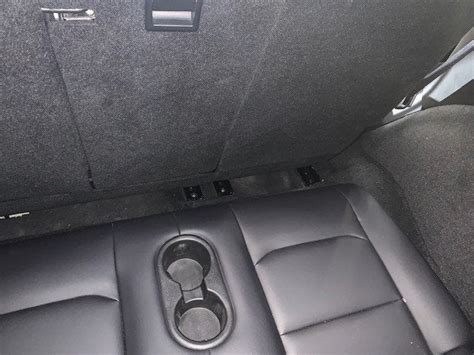 Tesla Model Y 3rd Row Pictures Reveal Little Leg Room | iPhone in ...