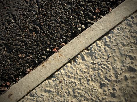 Asphalt vs. Concrete: What’s Best for Your Driveway? - Tool Digest