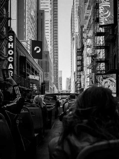 Tourists on an Open-Top Bus · Free Stock Photo