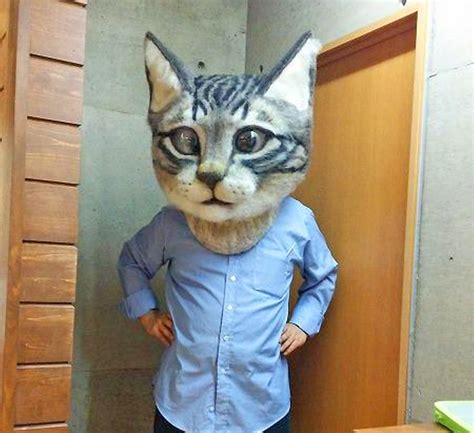 I Need One Of These Giant Super-Realistic Cat Head Masks In My Life