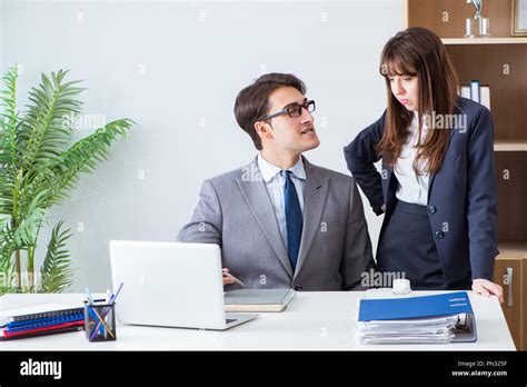 Boss and secretary in the office Stock Photo - Alamy