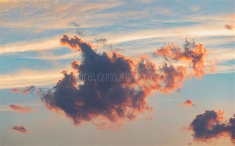 Fluffy Clouds Against Evening Sky at Sunset Stock Image - Image of ...