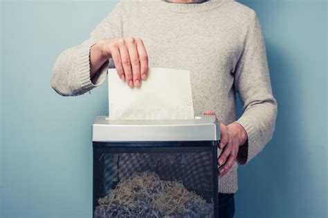 Man shredding paper stock photo. Image of shredding, business - 775246