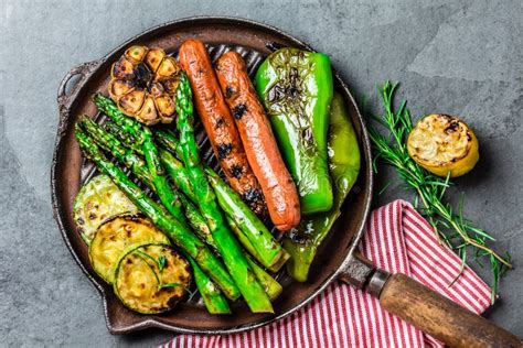 Grilled Vegetables And Sausages On Cast Iron Grill Pan. Gray Slate Background. Stock Image ...