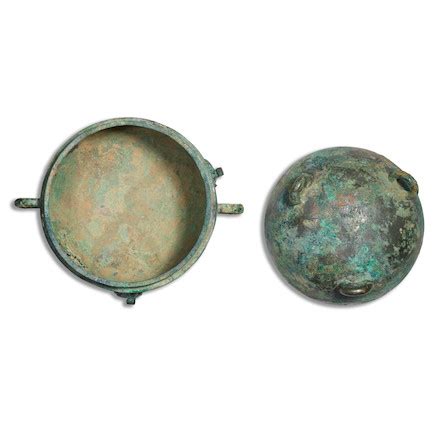 Bonhams : A PAIR OF ARCHAIC BRONZE RITUAL VESSELS AND COVERS, DUN ...