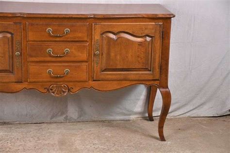 Ethan Allen country French style sideboard; 68-1098 - R.H. Lee & Co. Auctioneers