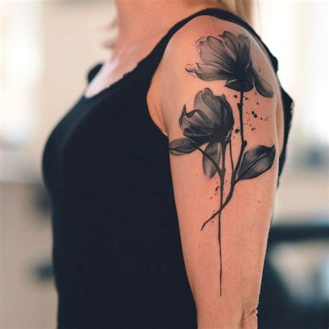 Black watercolor flower tattoo on the left upper arm Small Flower Tattoos, Flower Tattoo Sleeve ...