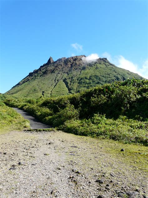 A hike up the active volcano Grande Soufrière on the Basse Terre island of Guadeloupe is as ...