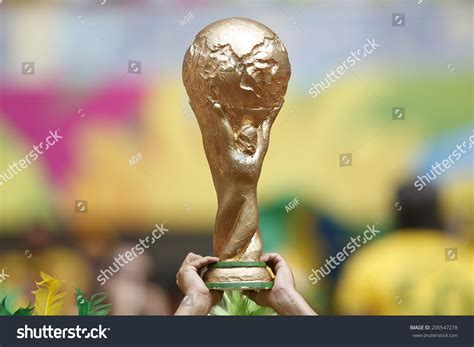 Brasilia, Brazil - June 23, 2014: A Fan Showing A Fake World Cup Trophy ...