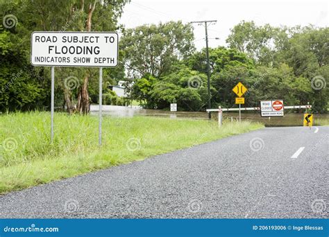 Warning Sign Road Subject To Flooding and Now Closed Due To Water Over Bridge Stock Photo ...