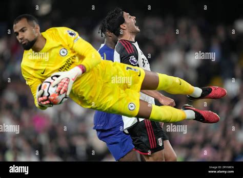 Chelsea's goalkeeper Robert Sanchez makes a save against Fulham's Raul ...