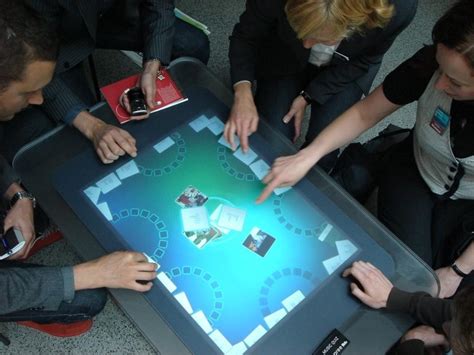 The Microsoft Surface table, I would love to have this at home... or at ...