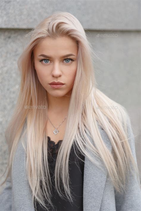 Stunning blue eyed blond woman, portrait Stock Photo by Vladdeep | PhotoDune