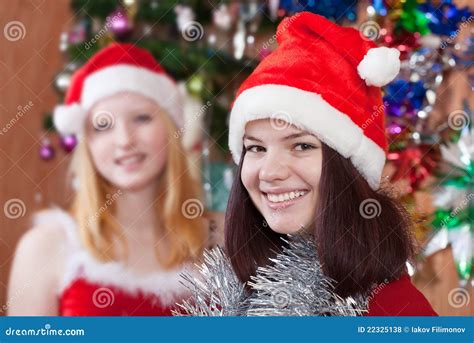 Girls in Christmas hats stock photo. Image of celebration - 22325138