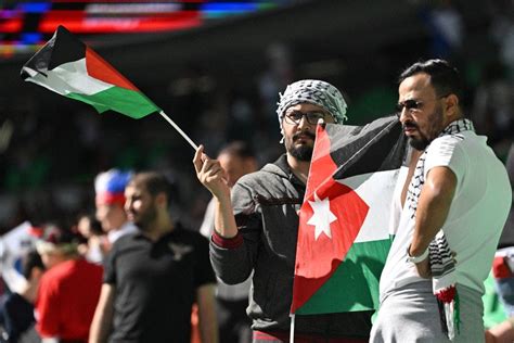 Pro-Palestine activists show solidarity with Gaza at Qatar Asian Cup ...