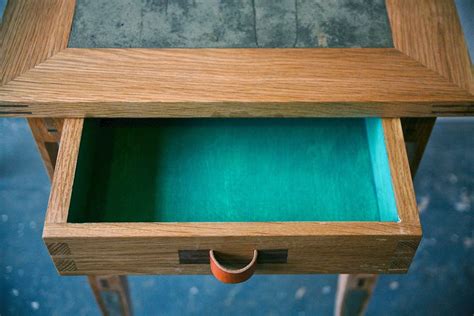 Temper Studio's Split Occasional Table in white oak and concrete with a ...