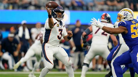 Russell Wilson forgets pick, leads Broncos to victory | 9news.com