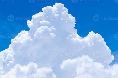 White fluffy clouds on blue sky. Soft touch feeling like cotton. White puffy cloudscape. Beauty ...