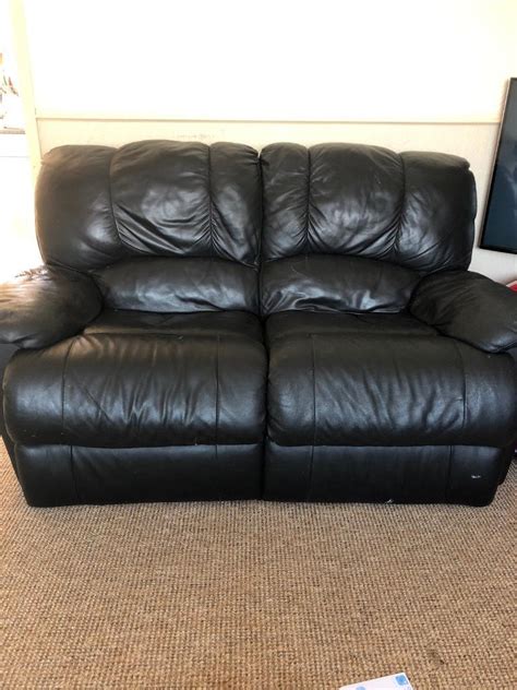 2 seater black leather sofa | in Hull, East Yorkshire | Gumtree