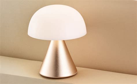 This mini LED lamp provides a soft, warm bedside light