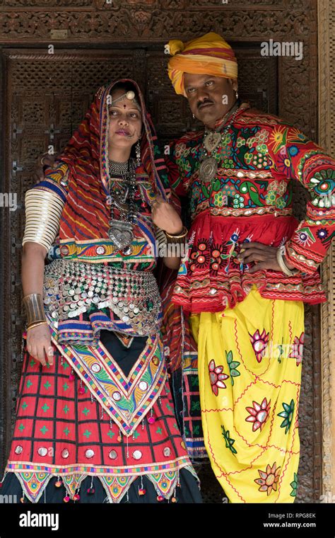 Couple standing together in traditional Rajasthani costume, Jaisalmer Fort, Jaisalmer, Rajasthan ...