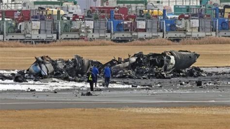 Japan Airlines plane catches fire after collision at Tokyo airport