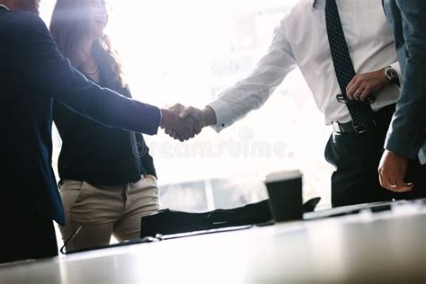 Business Men Shaking Hands with Each Other after a Deal Stock Image - Image of corporate, table ...