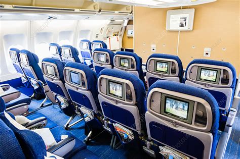 Economy class seats - Stock Image - C034/8843 - Science Photo Library