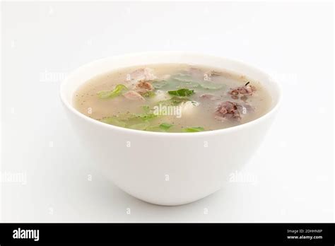 Pork intestine soup on white background Stock Photo - Alamy