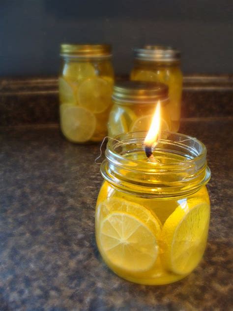 Lemon-filled Olive Oil Lanterns | Mason jar candles, Oil lantern diy ...