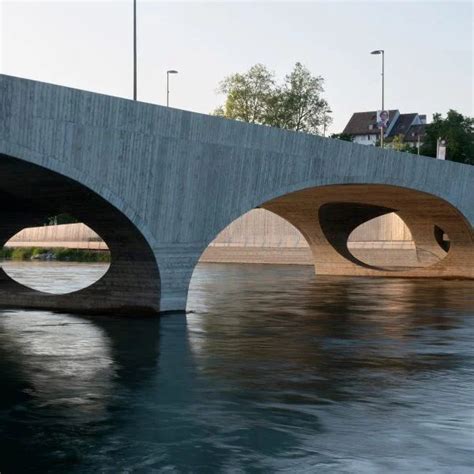 Christ & Gantenbein has added a sculptural concrete bridge across the Aare River in Aarau ...