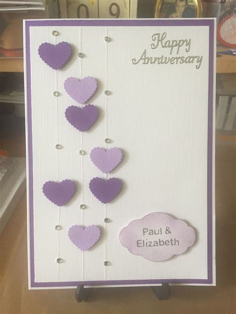 Simple Anniversary card using 2 Colours of die cut hearts. Lines put on ...