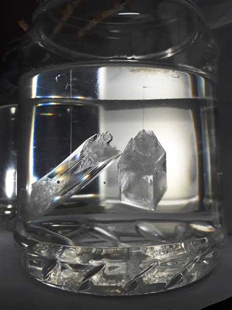 An update on my magnesium sulfate crystals. The big one is 9 cm long. : r/crystalgrowing