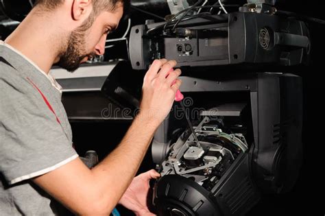 The Lighting Engineer Adjusts the Lights on the Stage Stock Photo - Image of broadcast, industry ...