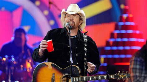 Fans and celebrities around the country fill up red solo cups in honor of the late Toby Keith ...