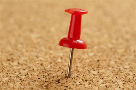 Free Stock Photo 10814 Red Sharp Marker Pin Pinned on a Cork Board | freeimageslive