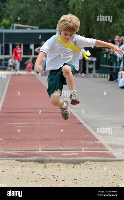 A child tries out long jump Stock Photo - Alamy