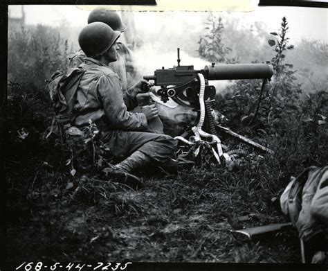 A heavy machine gun team fires at Camp Atterbury, Indiana on 6 ...