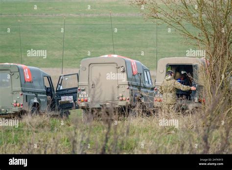 british army land rover defender wolf in action on a military exercise ...