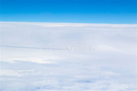 Flying Airplane in the Clouds Editorial Photo - Image of cloud ...