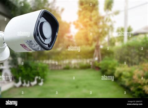 CCTV Closed circuit camera, TV monitoring in garden at home, security system concept Stock Photo ...