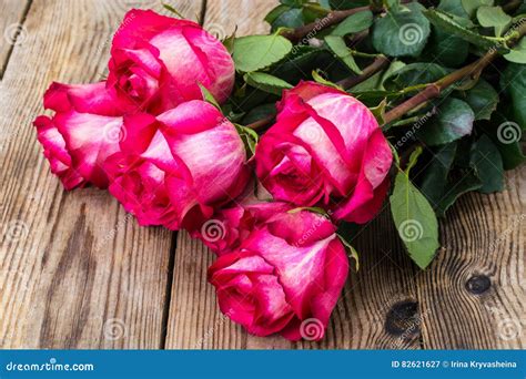 Roses on a Wooden Background Stock Image - Image of floral, flowers: 82621627